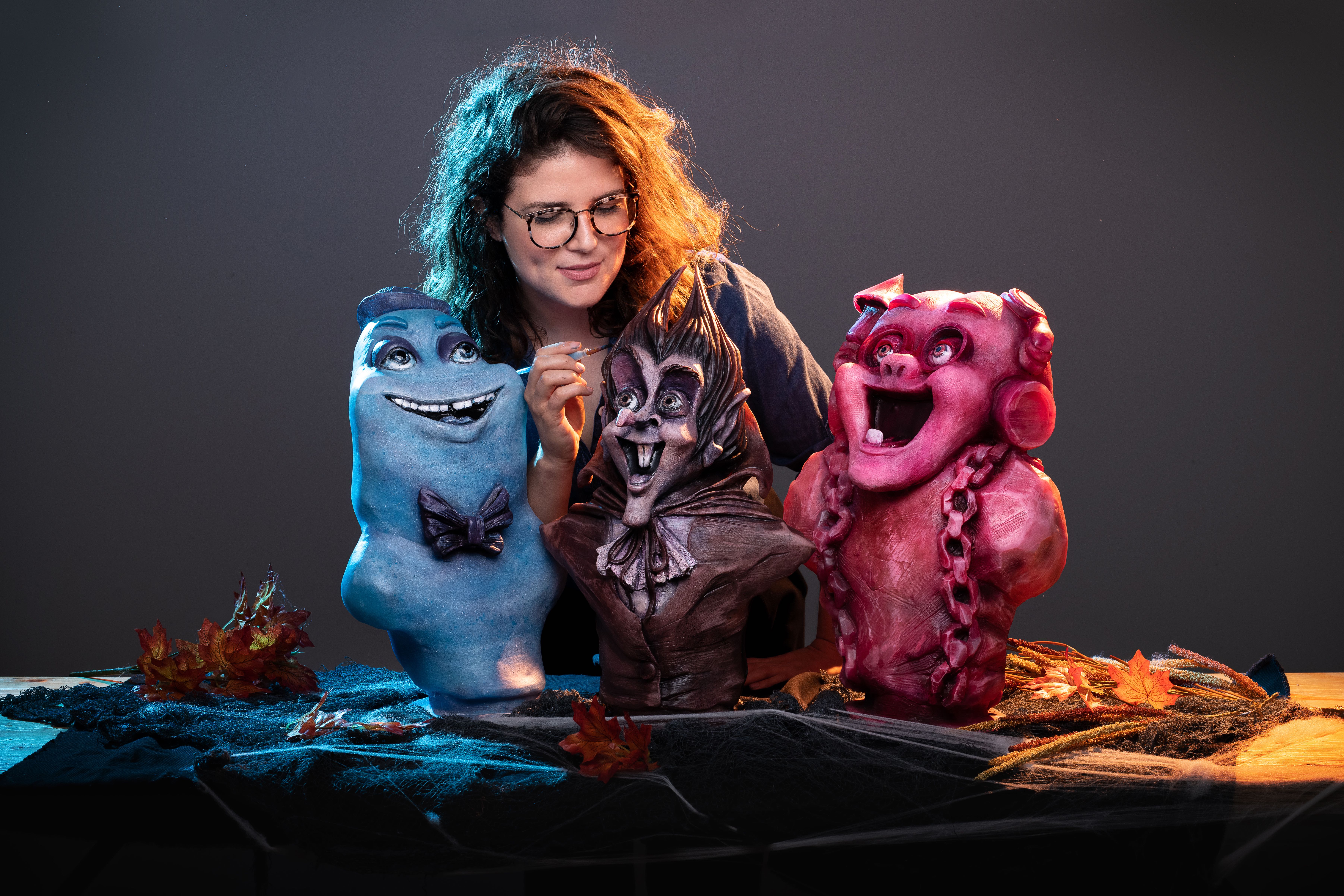 Karlee Morse adding finishing touches to Monster Cereal busts