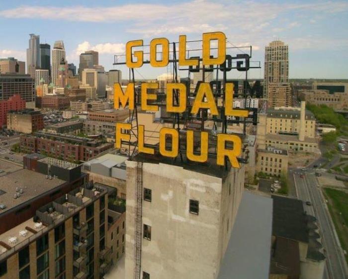 Yellow Gold Medal Flour sign with Minneapolis in the background